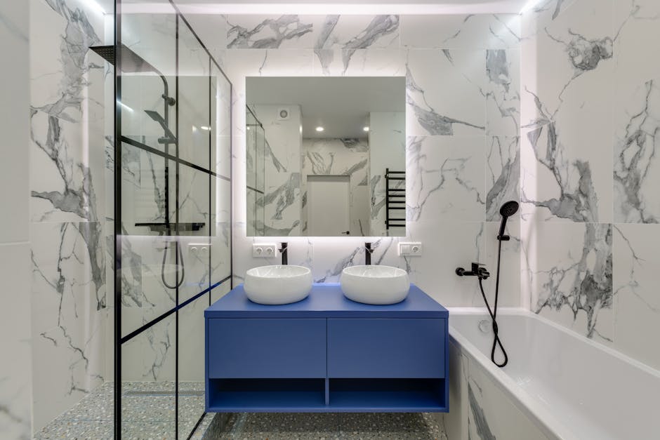 Professional contractor reviewing bathroom remodeling plans