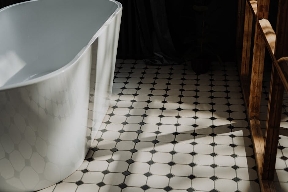 Craftsman performing precise tile installation